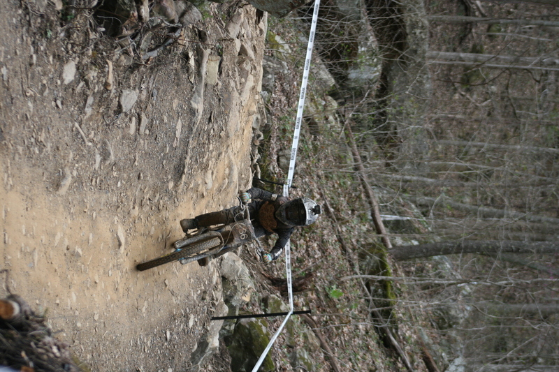 Tennessee National Mountain Bike Festival 2023 XXX.jpg :: Tennessee National 2023 - Tennessee Mountain Bike Festival 2023 - Windrock Bicycle Park in Oliver Springs, Tennessee, USA. Mountain Bike Downhill on the wooded trail in hills of Tennessee. Fast downhill action with aerials throughout the run. Red Bull gives you wings. 
