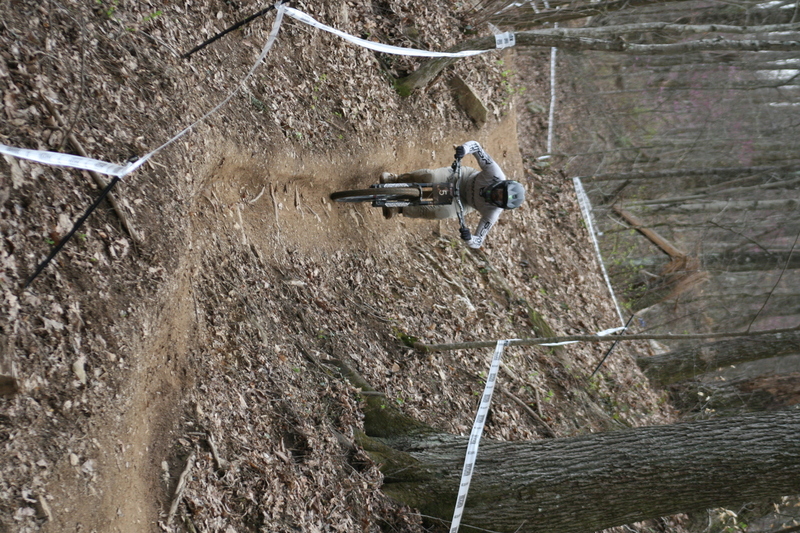 Tennessee National Mountain Bike Festival 2023 XXXIII.jpg :: Tennessee National 2023 - Tennessee Mountain Bike Festival 2023 - Windrock Bicycle Park in Oliver Springs, Tennessee, USA. Mountain Bike Downhill on the wooded trail in hills of Tennessee. Fast downhill action with aerials throughout the run. Red Bull gives you wings. 