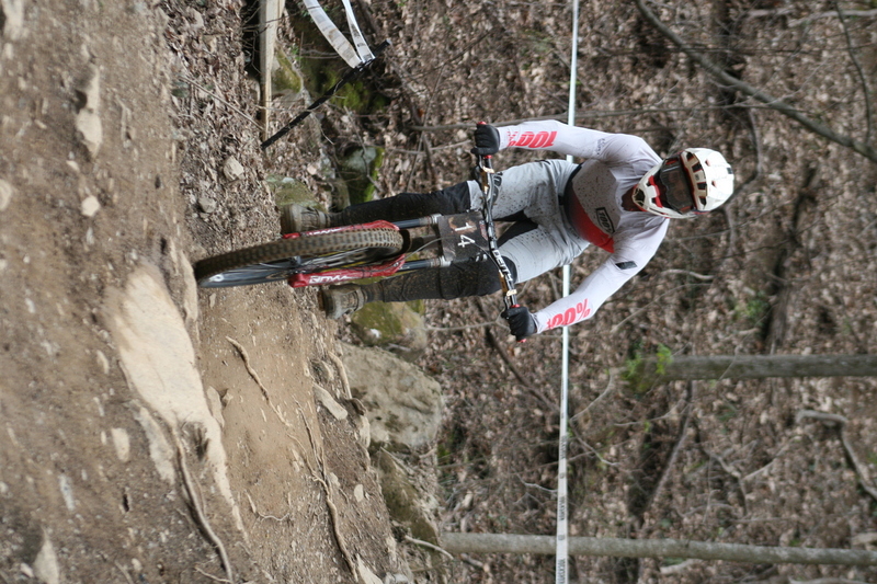 Tennessee National Mountain Bike Festival 2023 XXXIV.jpg :: Tennessee National 2023 - Tennessee Mountain Bike Festival 2023 - Windrock Bicycle Park in Oliver Springs, Tennessee, USA. Mountain Bike Downhill on the wooded trail in hills of Tennessee. Fast downhill action with aerials throughout the run. Red Bull gives you wings. 