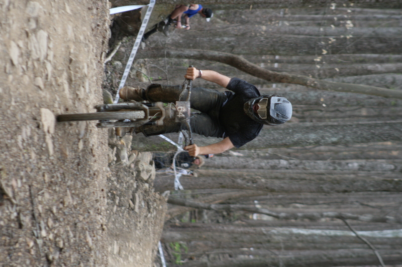 Tennessee National Mountain Bike Festival 2023 XXXIX.jpg :: Tennessee National 2023 - Tennessee Mountain Bike Festival 2023 - Windrock Bicycle Park in Oliver Springs, Tennessee, USA. Mountain Bike Downhill on the wooded trail in hills of Tennessee. Fast downhill action with aerials throughout the run. Red Bull gives you wings. 