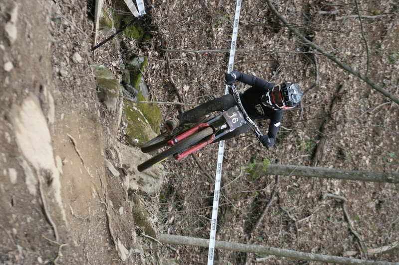 Tennessee National Mountain Bike Festival 2023 XXXV.jpg :: Tennessee National 2023 - Tennessee Mountain Bike Festival 2023 - Windrock Bicycle Park in Oliver Springs, Tennessee, USA. Mountain Bike Downhill on the wooded trail in hills of Tennessee. Fast downhill action with aerials throughout the run. Red Bull gives you wings. 