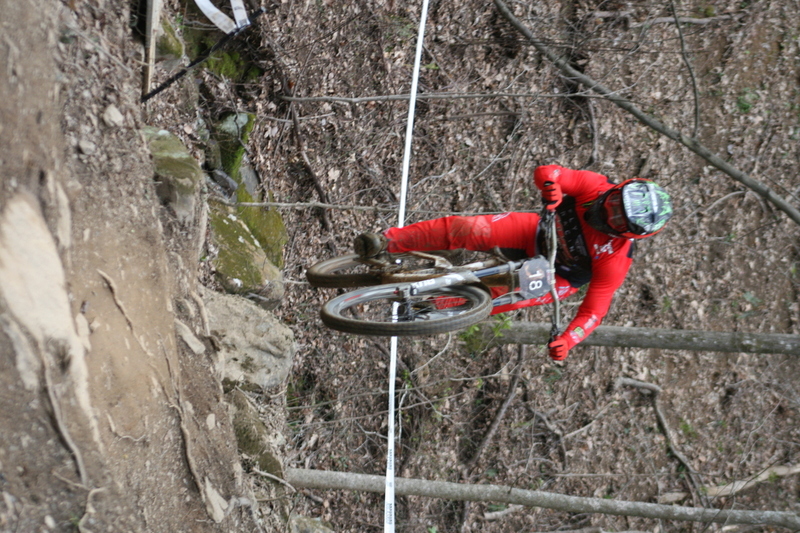 Tennessee National Mountain Bike Festival 2023 XXXVI.jpg :: Tennessee National 2023 - Tennessee Mountain Bike Festival 2023 - Windrock Bicycle Park in Oliver Springs, Tennessee, USA. Mountain Bike Downhill on the wooded trail in hills of Tennessee. Fast downhill action with aerials throughout the run. Red Bull gives you wings. 