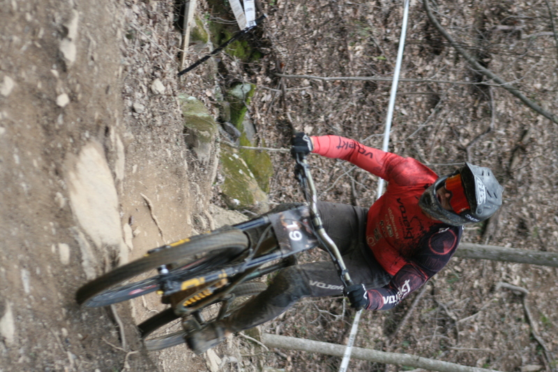 Tennessee National Mountain Bike Festival 2023 XXXVII.jpg :: Tennessee National 2023 - Tennessee Mountain Bike Festival 2023 - Windrock Bicycle Park in Oliver Springs, Tennessee, USA. Mountain Bike Downhill on the wooded trail in hills of Tennessee. Fast downhill action with aerials throughout the run. Red Bull gives you wings. 