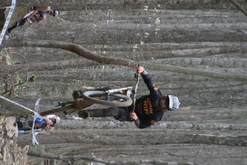Tennessee National Mountain Bike Festival 2023 XXXXI.jpg :: Tennessee National 2023 - Tennessee Mountain Bike Festival 2023 - Windrock Bicycle Park in Oliver Springs, Tennessee, USA. Mountain Bike Downhill on the wooded trail in hills of Tennessee. Fast downhill action with aerials throughout the run. Red Bull gives you wings. 