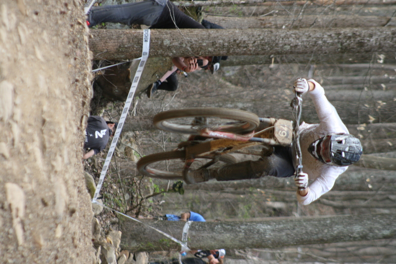 Tennessee National Mountain Bike Festival 2023 XXXXIV.jpg :: Tennessee National 2023 - Tennessee Mountain Bike Festival 2023 - Windrock Bicycle Park in Oliver Springs, Tennessee, USA. Mountain Bike Downhill on the wooded trail in hills of Tennessee. Fast downhill action with aerials throughout the run. Red Bull gives you wings. 