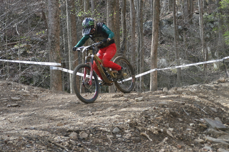 Tennessee National Mountain Bike Festival 2023 XXXXIX.jpg :: Tennessee National 2023 - Tennessee Mountain Bike Festival 2023 - Windrock Bicycle Park in Oliver Springs, Tennessee, USA. Mountain Bike Downhill on the wooded trail in hills of Tennessee. Fast downhill action with aerials throughout the run. Red Bull gives you wings. 