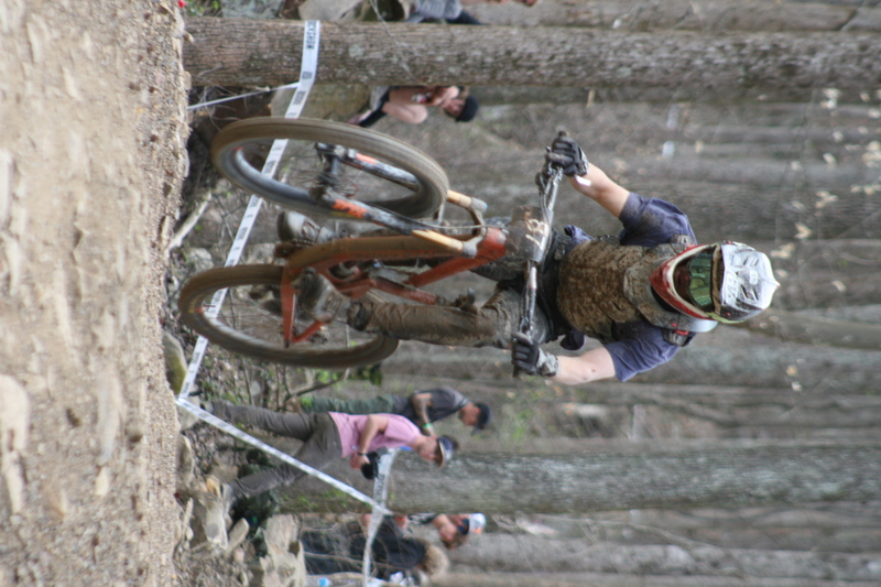 Tennessee National Mountain Bike Festival 2023 XXXXVI.jpg :: Tennessee National 2023 - Tennessee Mountain Bike Festival 2023 - Windrock Bicycle Park in Oliver Springs, Tennessee, USA. Mountain Bike Downhill on the wooded trail in hills of Tennessee. Fast downhill action with aerials throughout the run. Red Bull gives you wings. 