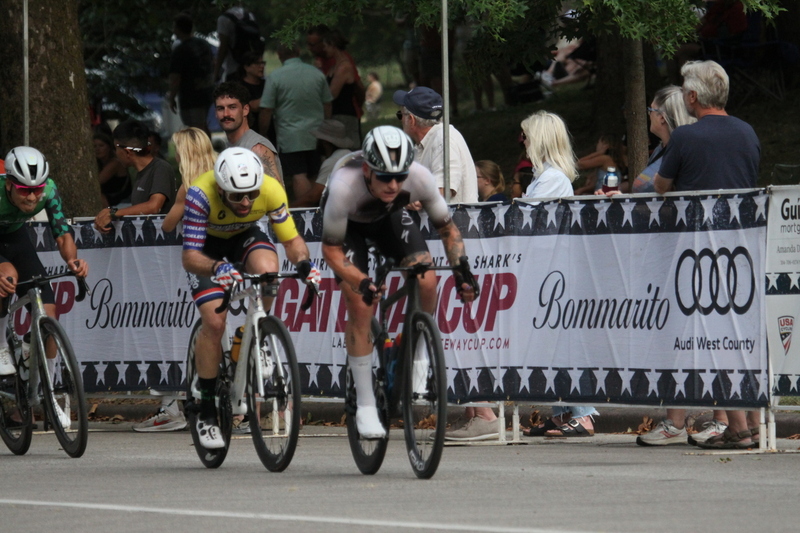 Tour De Francis Park 2025 E -LI.jpg :: Tour de Francis Park 2025/Gateway Cup 2025 - Men's Pro CAT 1, 70 minutes race, 150 rider field - Tour de Francis Park! Francis Park, named after David Rowland Francis - President of the Louisiana Purchase Exposition (the 1904 World's Fair) is known for its wide, tree lined streets and for having beautiful churches on every corner. Today the St. Louis Hills neighborhood showcases gingerbread bungalows, stately homes and some of the tidiest landscaping in St. Louis. - (Gateway Cup website) - Peloton - in a bicycle race, the term - peloton - refers to the main group of riders, also known as the -pack- or -bunch-. Riders race in a pack to draft, which means they ride closely together to save energy and improve speed. (Google) This is a USA Cycling sanctioned race event. 