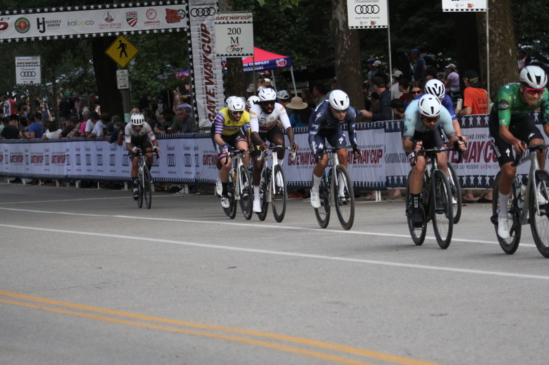 Tour De Francis Park 2025 E -LV.jpg :: Tour de Francis Park 2025/Gateway Cup 2025 - Men's Pro CAT 1, 70 minutes race, 150 rider field - Tour de Francis Park! Francis Park, named after David Rowland Francis - President of the Louisiana Purchase Exposition (the 1904 World's Fair) is known for its wide, tree lined streets and for having beautiful churches on every corner. Today the St. Louis Hills neighborhood showcases gingerbread bungalows, stately homes and some of the tidiest landscaping in St. Louis. - (Gateway Cup website) - Peloton - in a bicycle race, the term - peloton - refers to the main group of riders, also known as the -pack- or -bunch-. Riders race in a pack to draft, which means they ride closely together to save energy and improve speed. (Google) This is a USA Cycling sanctioned race event. 