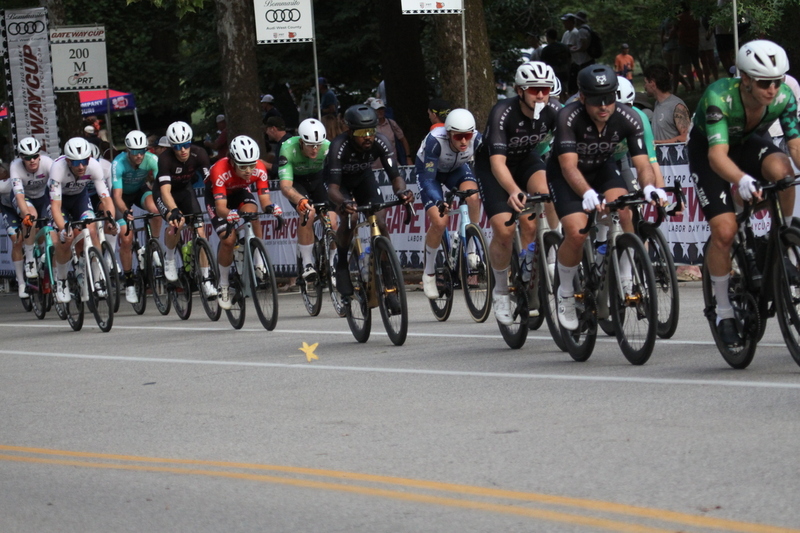 Tour De Francis Park 2025 E -LXI.jpg :: Tour de Francis Park 2025/Gateway Cup 2025 - Men's Pro CAT 1, 70 minutes race, 150 rider field - Tour de Francis Park! Francis Park, named after David Rowland Francis - President of the Louisiana Purchase Exposition (the 1904 World's Fair) is known for its wide, tree lined streets and for having beautiful churches on every corner. Today the St. Louis Hills neighborhood showcases gingerbread bungalows, stately homes and some of the tidiest landscaping in St. Louis. - (Gateway Cup website) - Peloton - in a bicycle race, the term - peloton - refers to the main group of riders, also known as the -pack- or -bunch-. Riders race in a pack to draft, which means they ride closely together to save energy and improve speed. (Google) This is a USA Cycling sanctioned race event. 