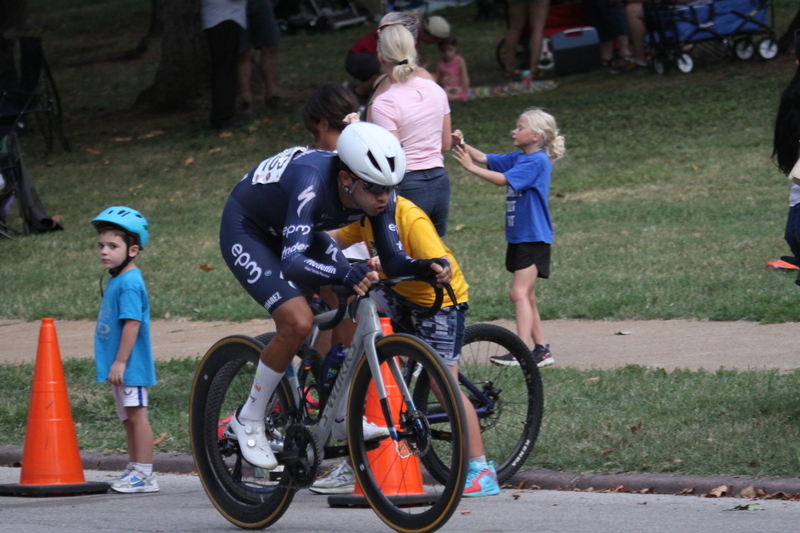 Tour De Francis Park 2025 E -LXII.jpg :: Tour de Francis Park 2025/Gateway Cup 2025 - Men's Pro CAT 1, 70 minutes race, 150 rider field - Tour de Francis Park! Francis Park, named after David Rowland Francis - President of the Louisiana Purchase Exposition (the 1904 World's Fair) is known for its wide, tree lined streets and for having beautiful churches on every corner. Today the St. Louis Hills neighborhood showcases gingerbread bungalows, stately homes and some of the tidiest landscaping in St. Louis. - (Gateway Cup website) - Peloton - in a bicycle race, the term - peloton - refers to the main group of riders, also known as the -pack- or -bunch-. Riders race in a pack to draft, which means they ride closely together to save energy and improve speed. (Google) This is a USA Cycling sanctioned race event. 