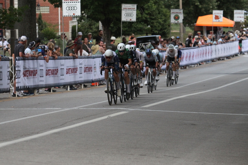 Tour De Francis Park 2025 E -LXVIII.jpg :: Tour de Francis Park 2025/Gateway Cup 2025 - Men's Pro CAT 1, 70 minutes race, 150 rider field - Tour de Francis Park! Francis Park, named after David Rowland Francis - President of the Louisiana Purchase Exposition (the 1904 World's Fair) is known for its wide, tree lined streets and for having beautiful churches on every corner. Today the St. Louis Hills neighborhood showcases gingerbread bungalows, stately homes and some of the tidiest landscaping in St. Louis. - (Gateway Cup website) - Peloton - in a bicycle race, the term - peloton - refers to the main group of riders, also known as the -pack- or -bunch-. Riders race in a pack to draft, which means they ride closely together to save energy and improve speed. (Google) This is a USA Cycling sanctioned race event. 