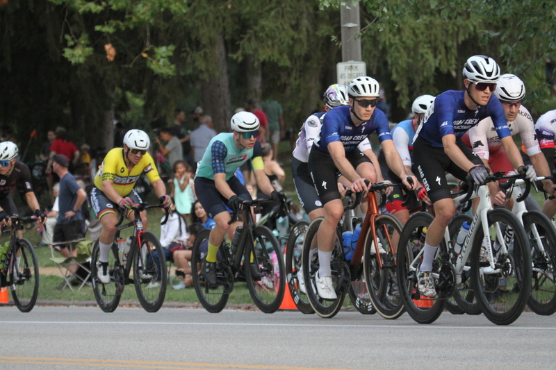 Tour De Francis Park 2025 E -XXXV.jpg :: Tour de Francis Park 2025/Gateway Cup 2025 - Men's Pro CAT 1, 70 minutes race, 150 rider field - Tour de Francis Park! Francis Park, named after David Rowland Francis - President of the Louisiana Purchase Exposition (the 1904 World's Fair) is known for its wide, tree lined streets and for having beautiful churches on every corner. Today the St. Louis Hills neighborhood showcases gingerbread bungalows, stately homes and some of the tidiest landscaping in St. Louis. - (Gateway Cup website) - Peloton - in a bicycle race, the term - peloton - refers to the main group of riders, also known as the -pack- or -bunch-. Riders race in a pack to draft, which means they ride closely together to save energy and improve speed. (Google) This is a USA Cycling sanctioned race event. 
