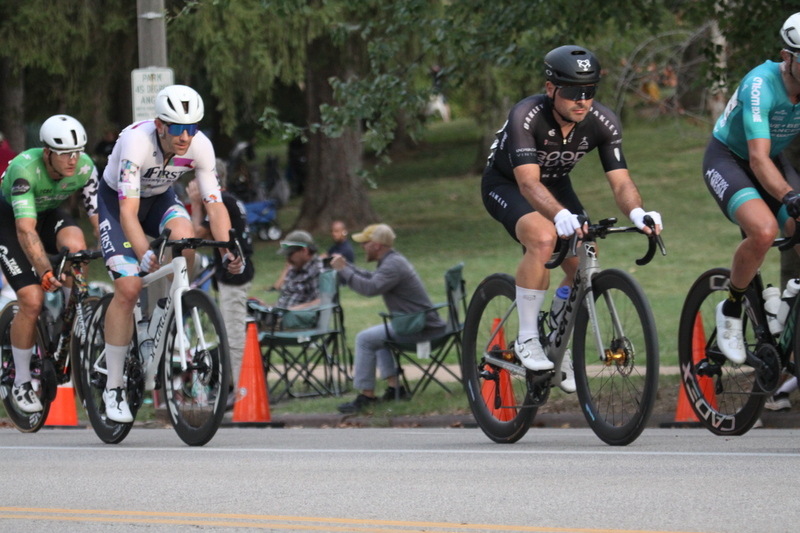 Tour De Francis Park 2025 E -XXXVIII.jpg :: Tour de Francis Park 2025/Gateway Cup 2025 - Men's Pro CAT 1, 70 minutes race, 150 rider field - Tour de Francis Park! Francis Park, named after David Rowland Francis - President of the Louisiana Purchase Exposition (the 1904 World's Fair) is known for its wide, tree lined streets and for having beautiful churches on every corner. Today the St. Louis Hills neighborhood showcases gingerbread bungalows, stately homes and some of the tidiest landscaping in St. Louis. - (Gateway Cup website) - Peloton - in a bicycle race, the term - peloton - refers to the main group of riders, also known as the -pack- or -bunch-. Riders race in a pack to draft, which means they ride closely together to save energy and improve speed. (Google) This is a USA Cycling sanctioned race event. 
