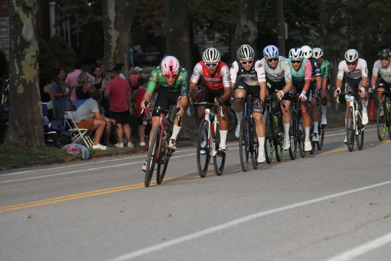 Tour De Francis Park 2025 E -XXXX.jpg :: Tour de Francis Park 2025/Gateway Cup 2025 - Men's Pro CAT 1, 70 minutes race, 150 rider field - Tour de Francis Park! Francis Park, named after David Rowland Francis - President of the Louisiana Purchase Exposition (the 1904 World's Fair) is known for its wide, tree lined streets and for having beautiful churches on every corner. Today the St. Louis Hills neighborhood showcases gingerbread bungalows, stately homes and some of the tidiest landscaping in St. Louis. - (Gateway Cup website) - Peloton - in a bicycle race, the term - peloton - refers to the main group of riders, also known as the -pack- or -bunch-. Riders race in a pack to draft, which means they ride closely together to save energy and improve speed. (Google) This is a USA Cycling sanctioned race event. 