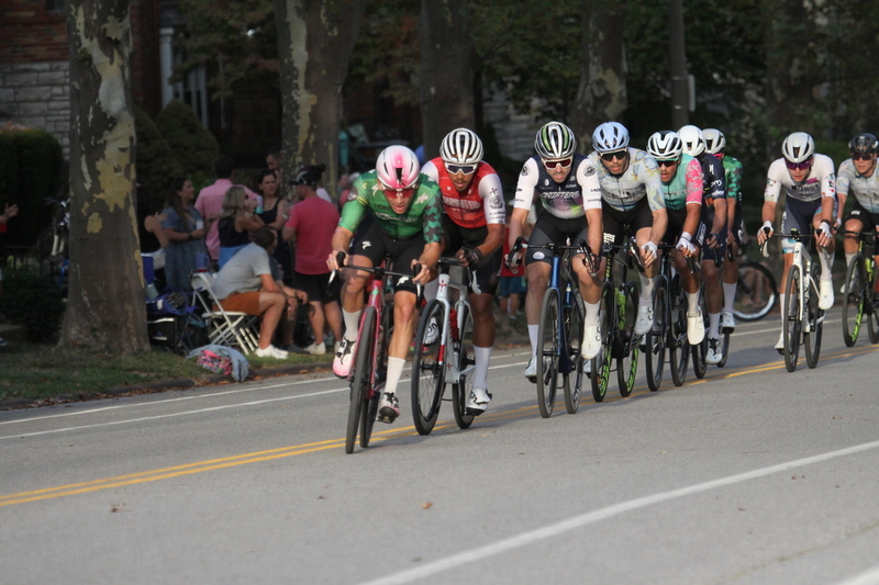 Tour De Francis Park 2025 E -XXXXI.jpg :: Tour de Francis Park 2025/Gateway Cup 2025 - Men's Pro CAT 1, 70 minutes race, 150 rider field - Tour de Francis Park! Francis Park, named after David Rowland Francis - President of the Louisiana Purchase Exposition (the 1904 World's Fair) is known for its wide, tree lined streets and for having beautiful churches on every corner. Today the St. Louis Hills neighborhood showcases gingerbread bungalows, stately homes and some of the tidiest landscaping in St. Louis. - (Gateway Cup website) - Peloton - in a bicycle race, the term - peloton - refers to the main group of riders, also known as the -pack- or -bunch-. Riders race in a pack to draft, which means they ride closely together to save energy and improve speed. (Google) This is a USA Cycling sanctioned race event. 