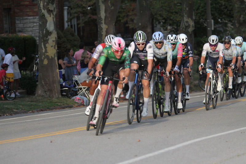 Tour De Francis Park 2025 E -XXXXII.jpg :: Tour de Francis Park 2025/Gateway Cup 2025 - Men's Pro CAT 1, 70 minutes race, 150 rider field - Tour de Francis Park! Francis Park, named after David Rowland Francis - President of the Louisiana Purchase Exposition (the 1904 World's Fair) is known for its wide, tree lined streets and for having beautiful churches on every corner. Today the St. Louis Hills neighborhood showcases gingerbread bungalows, stately homes and some of the tidiest landscaping in St. Louis. - (Gateway Cup website) - Peloton - in a bicycle race, the term - peloton - refers to the main group of riders, also known as the -pack- or -bunch-. Riders race in a pack to draft, which means they ride closely together to save energy and improve speed. (Google) This is a USA Cycling sanctioned race event. 