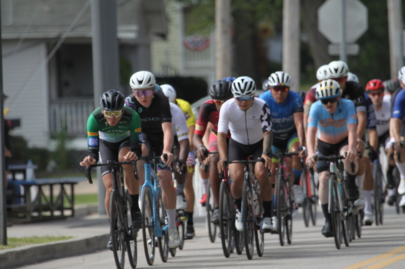 Tour de Florissant 2025 A -.jpg :: Tour de Florissant 2025/Gateway Cup 2025, 2025 - September 1st- Men's Cat 4/5, 40 minutes of racing, a field of 75 riders - Tour de Florissant - New course for 2025! The fourth and final leg of the Gateway Cup gets underway in Historic Old Town Florissant in St. Louis County. This technical course races through one of St. Louis' most nostalgic locales. Note - the course has been shifted to a flat finish in front of Historic City Hall, one mild climb, 6 turns. Category 4 (CAT 4) After gaining some experience, riders can upgrade to CAT 4, where races are longer and more competitive. USA Cycling, Big Shark Bicycle Company, Bommarito Audi West County
