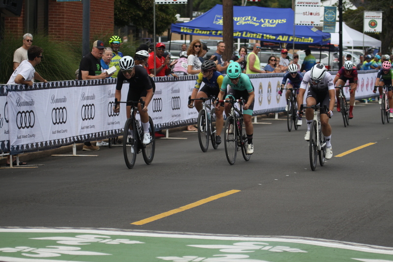 Tour de Florissant 2025 A -LXXXXIII.jpg :: Tour de Florissant 2025/Gateway Cup 2025 - Women's 3-4-5 & Women's 40+, 40 minutes of racing, a field of 75 riders - September, 1st, 2025 - Tour de Florissant - New Course for 2025! The fourth and final leg of the Gateway Cup gets underway in Historic Old Town Florissant in St. Louis County. This technical course races through one of St. Louis' most nostalgic locales. Note - the course has been shifted to a flat finish in front of Historic City Hall, one mild climb, 6 turns. Category 4 (CAT 4) After gaining some experience, riders can upgrade to CAT 4, where races are longer and more competitive. Category 3 (CAT 3) This intermediate category features longer and more challenging races, requiring a good understanding of racing tactics. USA Cycling 