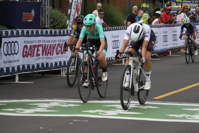 Tour de Florissant 2025 A -LXXXXVIII.jpg :: Tour de Florissant 2025/Gateway Cup 2025 - Women's 3-4-5 & Women's 40+, 40 minutes of racing, a field of 75 riders - September, 1st, 2025 - Tour de Florissant - New Course for 2025! The fourth and final leg of the Gateway Cup gets underway in Historic Old Town Florissant in St. Louis County. This technical course races through one of St. Louis' most nostalgic locales. Note - the course has been shifted to a flat finish in front of Historic City Hall, one mild climb, 6 turns. Category 4 (CAT 4) After gaining some experience, riders can upgrade to CAT 4, where races are longer and more competitive. Category 3 (CAT 3) This intermediate category features longer and more challenging races, requiring a good understanding of racing tactics. USA Cycling 