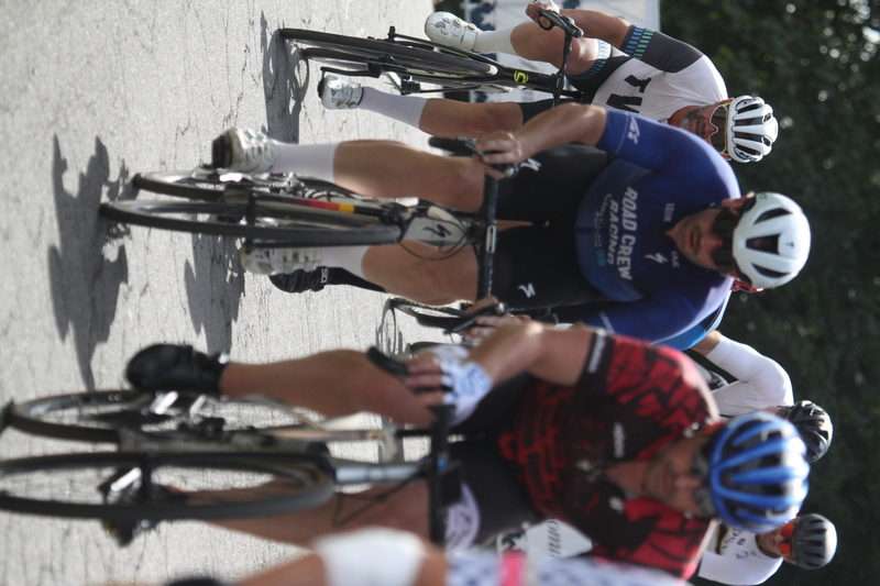 Tour de Florissant 2025 A -V.jpg :: Tour de Florissant 2025/Gateway Cup 2025, 2025 - September 1st- Men's Cat 4/5, 40 minutes of racing, a field of 75 riders - Tour de Florissant - New course for 2025! The fourth and final leg of the Gateway Cup gets underway in Historic Old Town Florissant in St. Louis County. This technical course races through one of St. Louis' most nostalgic locales. Note - the course has been shifted to a flat finish in front of Historic City Hall, one mild climb, 6 turns. Category 4 (CAT 4) After gaining some experience, riders can upgrade to CAT 4, where races are longer and more competitive. USA Cycling, Big Shark Bicycle Company, Bommarito Audi West County