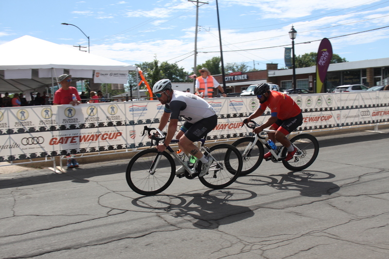 Tour de Florissant 2025 A -XXI.jpg :: Tour de Florissant 2025/Gateway Cup 2025, 2025 - September 1st- Men's Cat 4/5, 40 minutes of racing, a field of 75 riders - Tour de Florissant - New course for 2025! The fourth and final leg of the Gateway Cup gets underway in Historic Old Town Florissant in St. Louis County. This technical course races through one of St. Louis' most nostalgic locales. Note - the course has been shifted to a flat finish in front of Historic City Hall, one mild climb, 6 turns. Category 4 (CAT 4) After gaining some experience, riders can upgrade to CAT 4, where races are longer and more competitive. USA Cycling, Big Shark Bicycle Company, Bommarito Audi West County