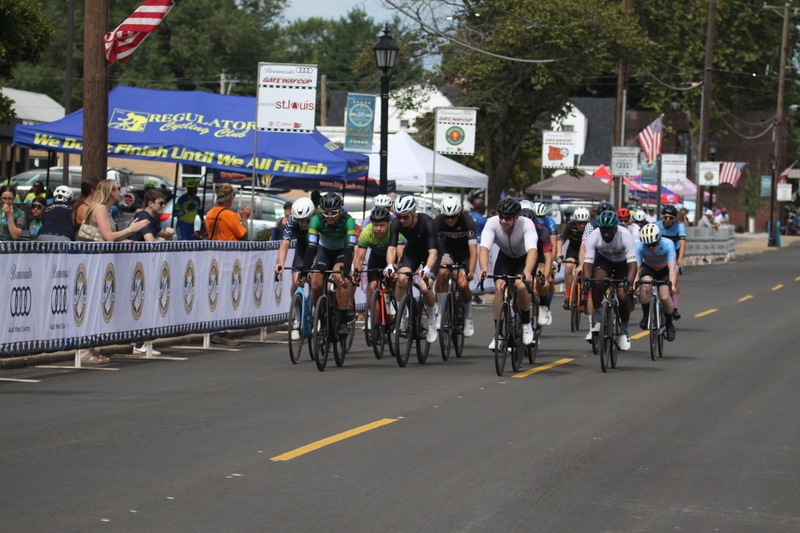 Tour de Florissant 2025 A -XXVI.jpg :: Tour de Florissant 2025/Gateway Cup 2025, 2025 - September 1st- Men's Cat 4/5, 40 minutes of racing, a field of 75 riders - Tour de Florissant - New course for 2025! The fourth and final leg of the Gateway Cup gets underway in Historic Old Town Florissant in St. Louis County. This technical course races through one of St. Louis' most nostalgic locales. Note - the course has been shifted to a flat finish in front of Historic City Hall, one mild climb, 6 turns. Category 4 (CAT 4) After gaining some experience, riders can upgrade to CAT 4, where races are longer and more competitive. USA Cycling, Big Shark Bicycle Company, Bommarito Audi West County