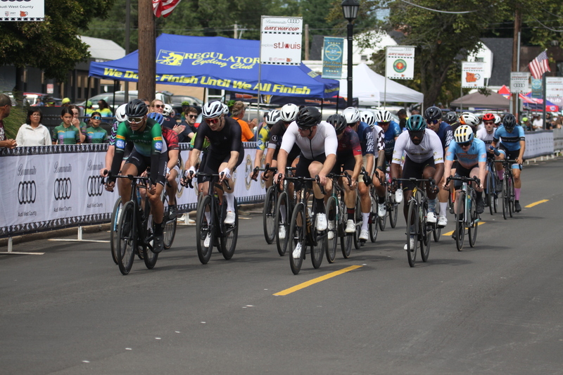 Tour de Florissant 2025 A -XXXII.jpg :: Tour de Florissant 2025/Gateway Cup 2025, 2025 - September 1st- Men's Cat 4/5, 40 minutes of racing, a field of 75 riders - Tour de Florissant - New course for 2025! The fourth and final leg of the Gateway Cup gets underway in Historic Old Town Florissant in St. Louis County. This technical course races through one of St. Louis' most nostalgic locales. Note - the course has been shifted to a flat finish in front of Historic City Hall, one mild climb, 6 turns. Category 4 (CAT 4) After gaining some experience, riders can upgrade to CAT 4, where races are longer and more competitive. USA Cycling, Big Shark Bicycle Company, Bommarito Audi West County