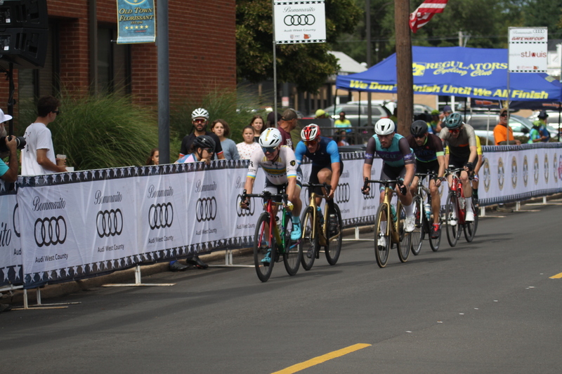 Tour de Florissant 2025 A -XXXIII.jpg :: Tour de Florissant 2025/Gateway Cup 2025, 2025 - September 1st- Men's Cat 4/5, 40 minutes of racing, a field of 75 riders - Tour de Florissant - New course for 2025! The fourth and final leg of the Gateway Cup gets underway in Historic Old Town Florissant in St. Louis County. This technical course races through one of St. Louis' most nostalgic locales. Note - the course has been shifted to a flat finish in front of Historic City Hall, one mild climb, 6 turns. Category 4 (CAT 4) After gaining some experience, riders can upgrade to CAT 4, where races are longer and more competitive. USA Cycling, Big Shark Bicycle Company, Bommarito Audi West County