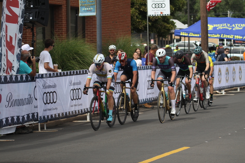 Tour de Florissant 2025 A -XXXV.jpg :: Tour de Florissant 2025/Gateway Cup 2025, 2025 - September 1st- Men's Cat 4/5, 40 minutes of racing, a field of 75 riders - Tour de Florissant - New course for 2025! The fourth and final leg of the Gateway Cup gets underway in Historic Old Town Florissant in St. Louis County. This technical course races through one of St. Louis' most nostalgic locales. Note - the course has been shifted to a flat finish in front of Historic City Hall, one mild climb, 6 turns. Category 4 (CAT 4) After gaining some experience, riders can upgrade to CAT 4, where races are longer and more competitive. USA Cycling, Big Shark Bicycle Company, Bommarito Audi West County