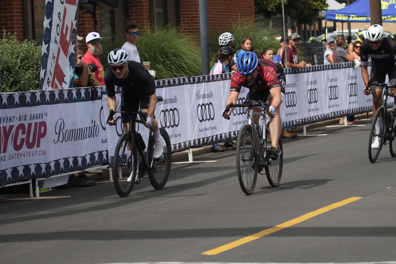 Tour de Florissant 2025 A -XXXXIII.jpg :: Tour de Florissant 2025/Gateway Cup 2025, 2025 - September 1st- Men's Cat 4/5, 40 minutes of racing, a field of 75 riders - Tour de Florissant - New course for 2025! The fourth and final leg of the Gateway Cup gets underway in Historic Old Town Florissant in St. Louis County. This technical course races through one of St. Louis' most nostalgic locales. Note - the course has been shifted to a flat finish in front of Historic City Hall, one mild climb, 6 turns. Category 4 (CAT 4) After gaining some experience, riders can upgrade to CAT 4, where races are longer and more competitive. USA Cycling, Big Shark Bicycle Company, Bommarito Audi West County