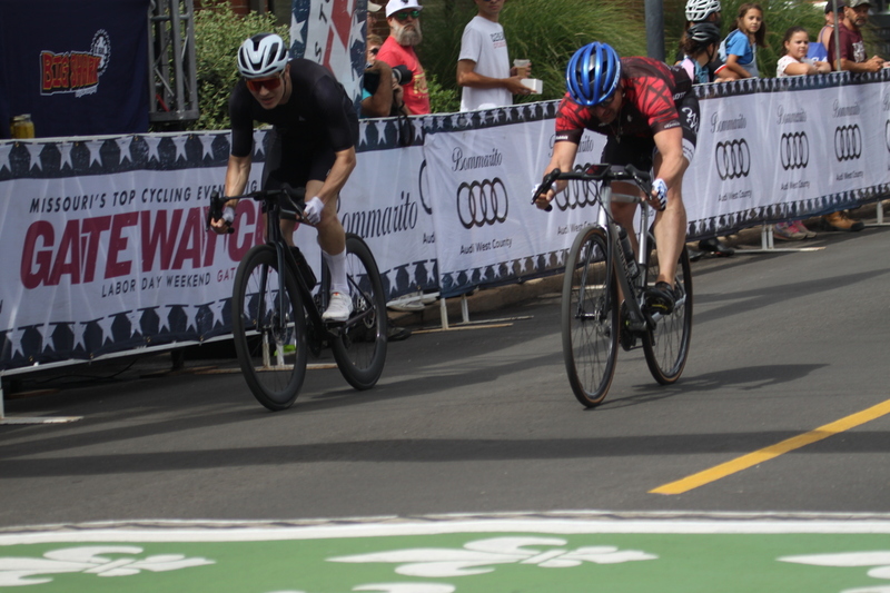 Tour de Florissant 2025 A -XXXXIV.jpg :: Tour de Florissant 2025/Gateway Cup 2025, 2025 - September 1st- Men's Cat 4/5, 40 minutes of racing, a field of 75 riders - Tour de Florissant - New course for 2025! The fourth and final leg of the Gateway Cup gets underway in Historic Old Town Florissant in St. Louis County. This technical course races through one of St. Louis' most nostalgic locales. Note - the course has been shifted to a flat finish in front of Historic City Hall, one mild climb, 6 turns. Category 4 (CAT 4) After gaining some experience, riders can upgrade to CAT 4, where races are longer and more competitive. USA Cycling, Big Shark Bicycle Company, Bommarito Audi West County