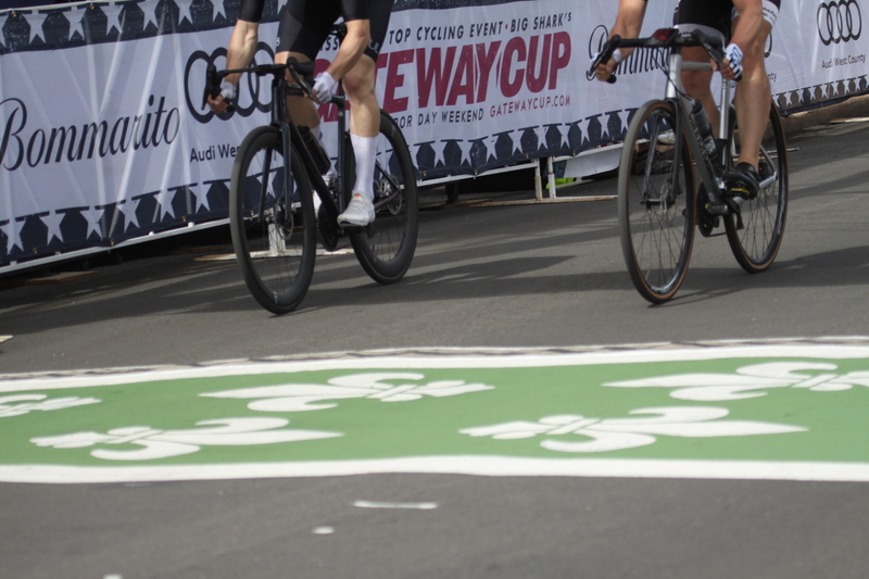 Tour de Florissant 2025 A -XXXXV.jpg :: Tour de Florissant 2025/Gateway Cup 2025, 2025 - September 1st- Men's Cat 4/5, 40 minutes of racing, a field of 75 riders - Tour de Florissant - New course for 2025! The fourth and final leg of the Gateway Cup gets underway in Historic Old Town Florissant in St. Louis County. This technical course races through one of St. Louis' most nostalgic locales. Note - the course has been shifted to a flat finish in front of Historic City Hall, one mild climb, 6 turns. Category 4 (CAT 4) After gaining some experience, riders can upgrade to CAT 4, where races are longer and more competitive. USA Cycling, Big Shark Bicycle Company, Bommarito Audi West County