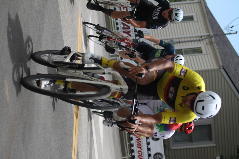 Tour de Florissant 2025 C -LXIV.jpg :: Tour de Florissant 2025/Gateway Cup 2025 - Men's CAT 3/4, 50 minutes of racing, a field of 100 - September 1st 2025 - Tour de Florissant - New Course for 2025! The fourth and final leg of the Gateway Cup gets underway in Historic Old Town Florissant in St. Louis County. This technical course races through one of St. Louis' most nostalgic locales. Note - the course has been shifted to a flat finish in front of Historic City Hall, one mild climb, 6 turns. Category 4 (CAT 4) After gaining some experience, riders can upgrade to CAT 4, where races are longer and more competitive. Category 3 (CAT 3) This intermediate category features longer and more challenging races, requiring a good understanding of racing tactics. USA Cycling
