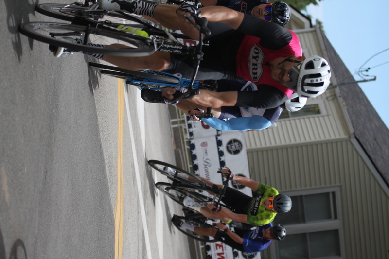 Tour de Florissant 2025 C -LXVI.jpg :: Tour de Florissant 2025/Gateway Cup 2025 - Men's CAT 3/4, 50 minutes of racing, a field of 100 - September 1st 2025 - Tour de Florissant - New Course for 2025! The fourth and final leg of the Gateway Cup gets underway in Historic Old Town Florissant in St. Louis County. This technical course races through one of St. Louis' most nostalgic locales. Note - the course has been shifted to a flat finish in front of Historic City Hall, one mild climb, 6 turns. Category 4 (CAT 4) After gaining some experience, riders can upgrade to CAT 4, where races are longer and more competitive. Category 3 (CAT 3) This intermediate category features longer and more challenging races, requiring a good understanding of racing tactics. USA Cycling