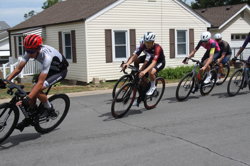 Tour de Florissant 2025 C -LXXVI.jpg :: Tour de Florissant 2025/Gateway Cup 2025 - Men's CAT 3/4, 50 minutes of racing, a field of 100 - September 1st 2025 - Tour de Florissant - New Course for 2025! The fourth and final leg of the Gateway Cup gets underway in Historic Old Town Florissant in St. Louis County. This technical course races through one of St. Louis' most nostalgic locales. Note - the course has been shifted to a flat finish in front of Historic City Hall, one mild climb, 6 turns. Category 4 (CAT 4) After gaining some experience, riders can upgrade to CAT 4, where races are longer and more competitive. Category 3 (CAT 3) This intermediate category features longer and more challenging races, requiring a good understanding of racing tactics. USA Cycling