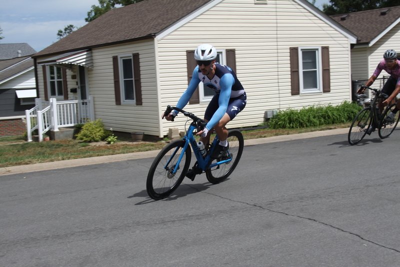 Tour de Florissant 2025 C -LXXXX.jpg :: Tour de Florissant 2025/Gateway Cup 2025 - Men's CAT 3/4, 50 minutes of racing, a field of 100 - September 1st 2025 - Tour de Florissant - New Course for 2025! The fourth and final leg of the Gateway Cup gets underway in Historic Old Town Florissant in St. Louis County. This technical course races through one of St. Louis' most nostalgic locales. Note - the course has been shifted to a flat finish in front of Historic City Hall, one mild climb, 6 turns. Category 4 (CAT 4) After gaining some experience, riders can upgrade to CAT 4, where races are longer and more competitive. Category 3 (CAT 3) This intermediate category features longer and more challenging races, requiring a good understanding of racing tactics. USA Cycling