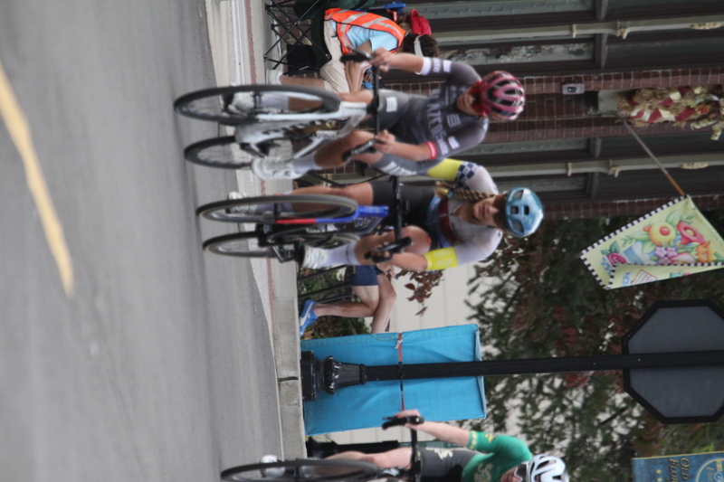 Tour de Florissant 2025 F -CI.jpg :: Tour de Florissant 2025 - Gateway Cup 2025 - September 1st 2025, Women's Pro CAT 1/2, 70 minutes of racing, a field of 150 racers, Tour de Florissant - New course for 2025! The fourth and final leg of the Gateway Cup gets underway in Historic Old Town Florissant in St. Louis County. This technical course races through one of St. Louis' most nostalgic locales. Note - the course has been shifted to a flat finish in front of Historic City Hall, one mild climb, 6 turns. Gateway Cup website - The finish of multiple races in USA Cycling is determined by the number of competitors in the field and the finishing position of the rider. For example, in a race with 5-10 competitors, the top finisher earns points, and the same applies to races with 11-20 competitors, 21-49 competitors, and so on. This points structure applies mass start races and is consistent across all disciplines of road racing. Additionally, there are ways to earn non-race upgrade points for Novice racers, such as finishing a USAC sanctioned Gran Fondo, which can count towards their required 10 upgrade points. 