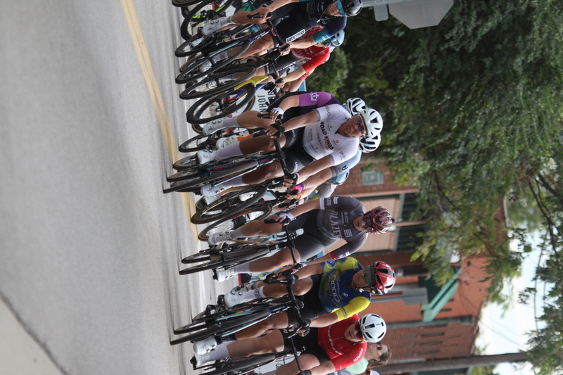 Tour de Florissant 2025 F -LXII.jpg :: Tour de Florissant 2025 - Gateway Cup 2025 - September 1st 2025, Women's Pro CAT 1/2, 70 minutes of racing, a field of 150 racers, Tour de Florissant - New course for 2025! The fourth and final leg of the Gateway Cup gets underway in Historic Old Town Florissant in St. Louis County. This technical course races through one of St. Louis' most nostalgic locales. Note - the course has been shifted to a flat finish in front of Historic City Hall, one mild climb, 6 turns. Gateway Cup website - The finish of multiple races in USA Cycling is determined by the number of competitors in the field and the finishing position of the rider. For example, in a race with 5-10 competitors, the top finisher earns points, and the same applies to races with 11-20 competitors, 21-49 competitors, and so on. This points structure applies mass start races and is consistent across all disciplines of road racing. Additionally, there are ways to earn non-race upgrade points for Novice racers, such as finishing a USAC sanctioned Gran Fondo, which can count towards their required 10 upgrade points. 