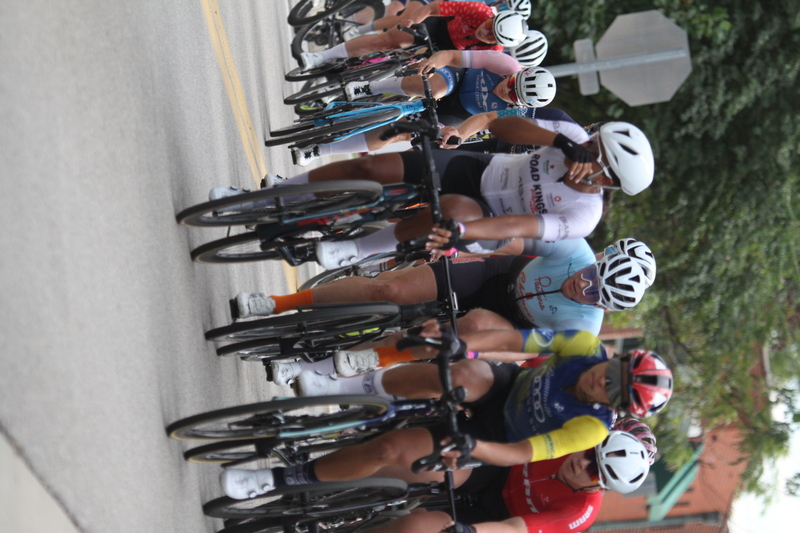 Tour de Florissant 2025 F -LXIV.jpg :: Tour de Florissant 2025 - Gateway Cup 2025 - September 1st 2025, Women's Pro CAT 1/2, 70 minutes of racing, a field of 150 racers, Tour de Florissant - New course for 2025! The fourth and final leg of the Gateway Cup gets underway in Historic Old Town Florissant in St. Louis County. This technical course races through one of St. Louis' most nostalgic locales. Note - the course has been shifted to a flat finish in front of Historic City Hall, one mild climb, 6 turns. Gateway Cup website - The finish of multiple races in USA Cycling is determined by the number of competitors in the field and the finishing position of the rider. For example, in a race with 5-10 competitors, the top finisher earns points, and the same applies to races with 11-20 competitors, 21-49 competitors, and so on. This points structure applies mass start races and is consistent across all disciplines of road racing. Additionally, there are ways to earn non-race upgrade points for Novice racers, such as finishing a USAC sanctioned Gran Fondo, which can count towards their required 10 upgrade points. 