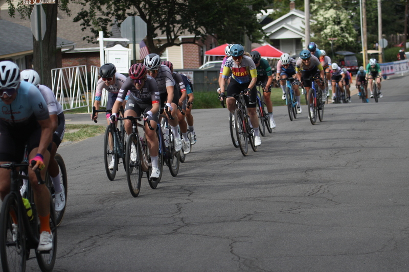 Tour de Florissant 2025 F -LXXII.jpg :: Tour de Florissant 2025 - Gateway Cup 2025 - September 1st 2025, Women's Pro CAT 1/2, 70 minutes of racing, a field of 150 racers, Tour de Florissant - New course for 2025! The fourth and final leg of the Gateway Cup gets underway in Historic Old Town Florissant in St. Louis County. This technical course races through one of St. Louis' most nostalgic locales. Note - the course has been shifted to a flat finish in front of Historic City Hall, one mild climb, 6 turns. Gateway Cup website - The finish of multiple races in USA Cycling is determined by the number of competitors in the field and the finishing position of the rider. For example, in a race with 5-10 competitors, the top finisher earns points, and the same applies to races with 11-20 competitors, 21-49 competitors, and so on. This points structure applies mass start races and is consistent across all disciplines of road racing. Additionally, there are ways to earn non-race upgrade points for Novice racers, such as finishing a USAC sanctioned Gran Fondo, which can count towards their required 10 upgrade points. 