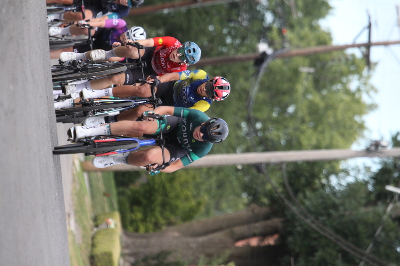 Tour de Florissant 2025 F -LXXXVII.jpg :: Tour de Florissant 2025 - Gateway Cup 2025 - September 1st 2025, Women's Pro CAT 1/2, 70 minutes of racing, a field of 150 racers, Tour de Florissant - New course for 2025! The fourth and final leg of the Gateway Cup gets underway in Historic Old Town Florissant in St. Louis County. This technical course races through one of St. Louis' most nostalgic locales. Note - the course has been shifted to a flat finish in front of Historic City Hall, one mild climb, 6 turns. Gateway Cup website - The finish of multiple races in USA Cycling is determined by the number of competitors in the field and the finishing position of the rider. For example, in a race with 5-10 competitors, the top finisher earns points, and the same applies to races with 11-20 competitors, 21-49 competitors, and so on. This points structure applies mass start races and is consistent across all disciplines of road racing. Additionally, there are ways to earn non-race upgrade points for Novice racers, such as finishing a USAC sanctioned Gran Fondo, which can count towards their required 10 upgrade points. 