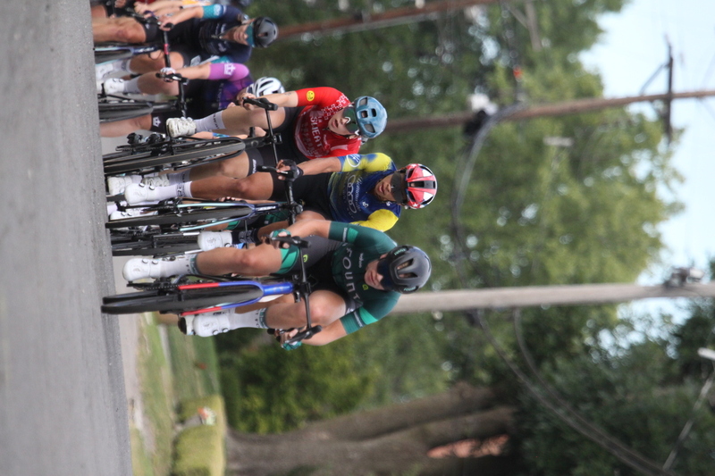 Tour de Florissant 2025 F -LXXXVIII.jpg :: Tour de Florissant 2025 - Gateway Cup 2025 - September 1st 2025, Women's Pro CAT 1/2, 70 minutes of racing, a field of 150 racers, Tour de Florissant - New course for 2025! The fourth and final leg of the Gateway Cup gets underway in Historic Old Town Florissant in St. Louis County. This technical course races through one of St. Louis' most nostalgic locales. Note - the course has been shifted to a flat finish in front of Historic City Hall, one mild climb, 6 turns. Gateway Cup website - The finish of multiple races in USA Cycling is determined by the number of competitors in the field and the finishing position of the rider. For example, in a race with 5-10 competitors, the top finisher earns points, and the same applies to races with 11-20 competitors, 21-49 competitors, and so on. This points structure applies mass start races and is consistent across all disciplines of road racing. Additionally, there are ways to earn non-race upgrade points for Novice racers, such as finishing a USAC sanctioned Gran Fondo, which can count towards their required 10 upgrade points. 