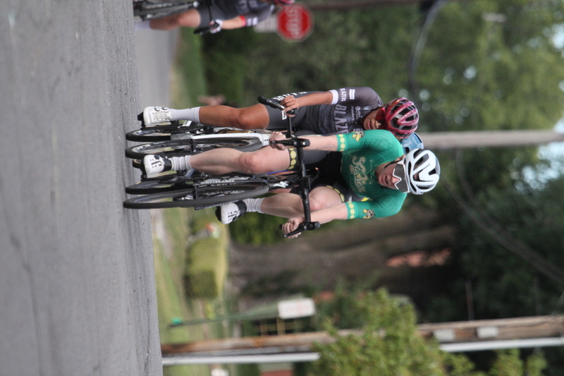Tour de Florissant 2025 F -LXXXXIII.jpg :: Tour de Florissant 2025 - Gateway Cup 2025 - September 1st 2025, Women's Pro CAT 1/2, 70 minutes of racing, a field of 150 racers, Tour de Florissant - New course for 2025! The fourth and final leg of the Gateway Cup gets underway in Historic Old Town Florissant in St. Louis County. This technical course races through one of St. Louis' most nostalgic locales. Note - the course has been shifted to a flat finish in front of Historic City Hall, one mild climb, 6 turns. Gateway Cup website - The finish of multiple races in USA Cycling is determined by the number of competitors in the field and the finishing position of the rider. For example, in a race with 5-10 competitors, the top finisher earns points, and the same applies to races with 11-20 competitors, 21-49 competitors, and so on. This points structure applies mass start races and is consistent across all disciplines of road racing. Additionally, there are ways to earn non-race upgrade points for Novice racers, such as finishing a USAC sanctioned Gran Fondo, which can count towards their required 10 upgrade points. 