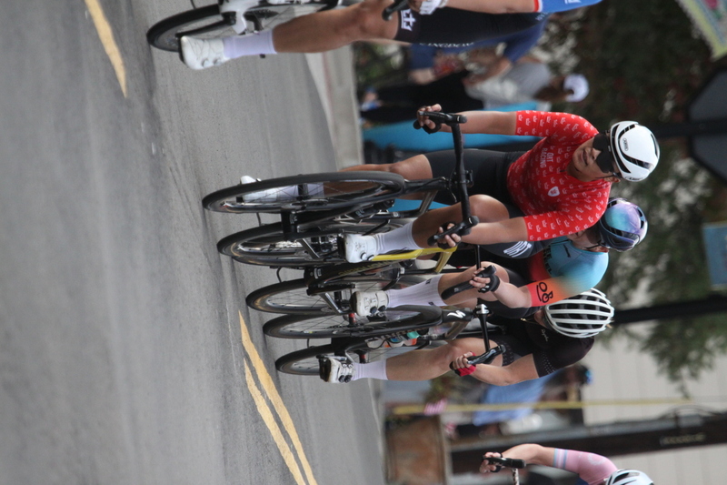 Tour de Florissant 2025 F -LXXXXVI.jpg :: Tour de Florissant 2025 - Gateway Cup 2025 - September 1st 2025, Women's Pro CAT 1/2, 70 minutes of racing, a field of 150 racers, Tour de Florissant - New course for 2025! The fourth and final leg of the Gateway Cup gets underway in Historic Old Town Florissant in St. Louis County. This technical course races through one of St. Louis' most nostalgic locales. Note - the course has been shifted to a flat finish in front of Historic City Hall, one mild climb, 6 turns. Gateway Cup website - The finish of multiple races in USA Cycling is determined by the number of competitors in the field and the finishing position of the rider. For example, in a race with 5-10 competitors, the top finisher earns points, and the same applies to races with 11-20 competitors, 21-49 competitors, and so on. This points structure applies mass start races and is consistent across all disciplines of road racing. Additionally, there are ways to earn non-race upgrade points for Novice racers, such as finishing a USAC sanctioned Gran Fondo, which can count towards their required 10 upgrade points. 