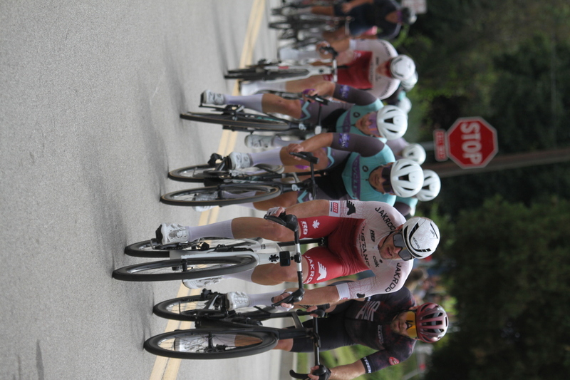 Tour de Florissant 2025 F -XIX.jpg :: Tour de Florissant 2025 - Gateway Cup 2025 - September 1st 2025 - Men's CAT 2-3, 55 Minutes of racing, a field of 150 racers - Tour de Florissant - New course for 2025! The fourth and final leg of the Gateway Cup gets underway in Historic Old Town Florissant in St. Louis County. This technical course races through one of St. Louis' most nostalgic locales. Note - the course has been shifted to a flat finish in front of Historic City Hall, one mild climb, 6 turns. Gateway Cup website - In mass start cycling racers, the winner is determined by the first rider to cross the finish line. However, the race format can vary, and some events may have additional criteria or rules that can influence the winner. For example, in points races, the rider with the most points at the end of the race wins, and in sprint events, the winner is determined by the third rider to cross the finish line after a series of sprints. Wikipedia - The slower riders will be asked to exit the racecourse if not on the lead lap with five laps to go. This is to not interrupt the lead lap riders that are going to have the hard fast finish. Riders in lower categories are given one lap to go with two or three laps to go. This determines the winner of the lower category race in mass start race finishes for this event. Pace motorcycles help keep track of slower riders and categories. Given a number and riders to watch. 