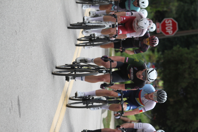 Tour de Florissant 2025 F -XVIII.jpg :: Tour de Florissant 2025 - Gateway Cup 2025 - September 1st 2025 - Men's CAT 2-3, 55 Minutes of racing, a field of 150 racers - Tour de Florissant - New course for 2025! The fourth and final leg of the Gateway Cup gets underway in Historic Old Town Florissant in St. Louis County. This technical course races through one of St. Louis' most nostalgic locales. Note - the course has been shifted to a flat finish in front of Historic City Hall, one mild climb, 6 turns. Gateway Cup website - In mass start cycling racers, the winner is determined by the first rider to cross the finish line. However, the race format can vary, and some events may have additional criteria or rules that can influence the winner. For example, in points races, the rider with the most points at the end of the race wins, and in sprint events, the winner is determined by the third rider to cross the finish line after a series of sprints. Wikipedia - The slower riders will be asked to exit the racecourse if not on the lead lap with five laps to go. This is to not interrupt the lead lap riders that are going to have the hard fast finish. Riders in lower categories are given one lap to go with two or three laps to go. This determines the winner of the lower category race in mass start race finishes for this event. Pace motorcycles help keep track of slower riders and categories. Given a number and riders to watch. 