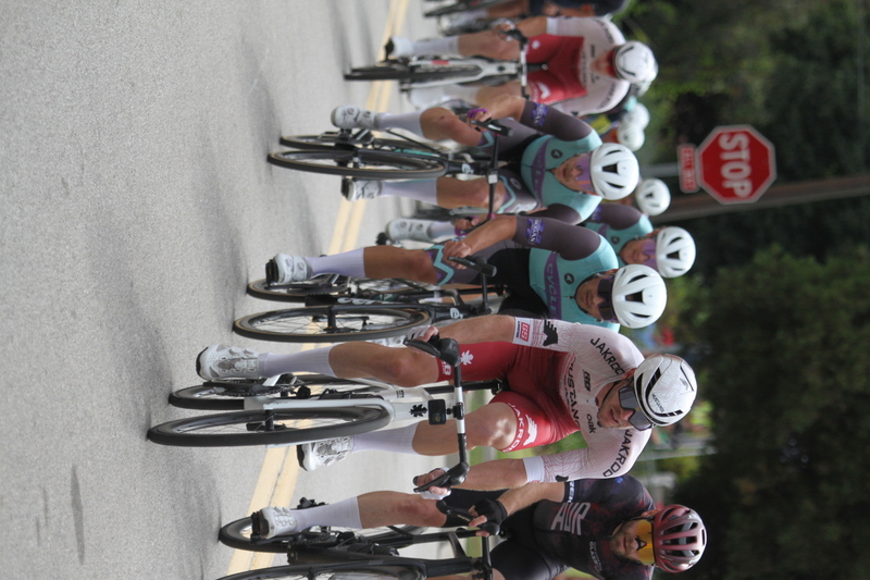 Tour de Florissant 2025 F -XXI.jpg :: Tour de Florissant 2025 - Gateway Cup 2025 - September 1st 2025 - Men's CAT 2-3, 55 Minutes of racing, a field of 150 racers - Tour de Florissant - New course for 2025! The fourth and final leg of the Gateway Cup gets underway in Historic Old Town Florissant in St. Louis County. This technical course races through one of St. Louis' most nostalgic locales. Note - the course has been shifted to a flat finish in front of Historic City Hall, one mild climb, 6 turns. Gateway Cup website - In mass start cycling racers, the winner is determined by the first rider to cross the finish line. However, the race format can vary, and some events may have additional criteria or rules that can influence the winner. For example, in points races, the rider with the most points at the end of the race wins, and in sprint events, the winner is determined by the third rider to cross the finish line after a series of sprints. Wikipedia - The slower riders will be asked to exit the racecourse if not on the lead lap with five laps to go. This is to not interrupt the lead lap riders that are going to have the hard fast finish. Riders in lower categories are given one lap to go with two or three laps to go. This determines the winner of the lower category race in mass start race finishes for this event. Pace motorcycles help keep track of slower riders and categories. Given a number and riders to watch. 