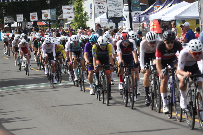 Tour de Florissant 2025 F -XXXI.jpg :: Tour de Florissant 2025 - Gateway Cup 2025 - September 1st 2025 - Men's CAT 2-3, 55 Minutes of racing, a field of 150 racers - Tour de Florissant - New course for 2025! The fourth and final leg of the Gateway Cup gets underway in Historic Old Town Florissant in St. Louis County. This technical course races through one of St. Louis' most nostalgic locales. Note - the course has been shifted to a flat finish in front of Historic City Hall, one mild climb, 6 turns. Gateway Cup website - In mass start cycling racers, the winner is determined by the first rider to cross the finish line. However, the race format can vary, and some events may have additional criteria or rules that can influence the winner. For example, in points races, the rider with the most points at the end of the race wins, and in sprint events, the winner is determined by the third rider to cross the finish line after a series of sprints. Wikipedia - The slower riders will be asked to exit the racecourse if not on the lead lap with five laps to go. This is to not interrupt the lead lap riders that are going to have the hard fast finish. Riders in lower categories are given one lap to go with two or three laps to go. This determines the winner of the lower category race in mass start race finishes for this event. Pace motorcycles help keep track of slower riders and categories. Given a number and riders to watch. 