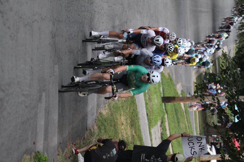 Tour de Florissant 2025 G -LXXXVII.jpg :: Tour de Florissant 2025/Gateway Cup 2025 - Men's Pro Cycling CAT I - September 1st 2025 - Tour de Florissant - New course for 2025! The fourth and final leg of the Gateway Cup gets underway in Historic Old Town Florissant in St. Louis County. This technical course races through one of St. Louis' most nostalgic locales. Note - the course has been shifted to a flat finish in front of Historic City Hall, one mild climb, 6 turns. (Gateway Cup website) In mass start cycling races, the winner is determined by the first rider to cross the finish line. However, the race format can vary, and some events may have additional criteria or rules that can influence the winner. For example, in points races, the rider with the most points at the end of the race wins, and in sprint events, the winner is determined by the third rider to cross the finish line after a series of sprints. (Wikipedia) USA Cycling